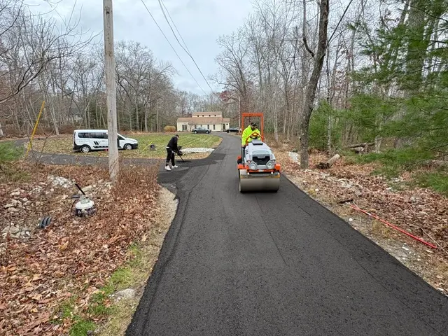 Residential asphalt driveway installation